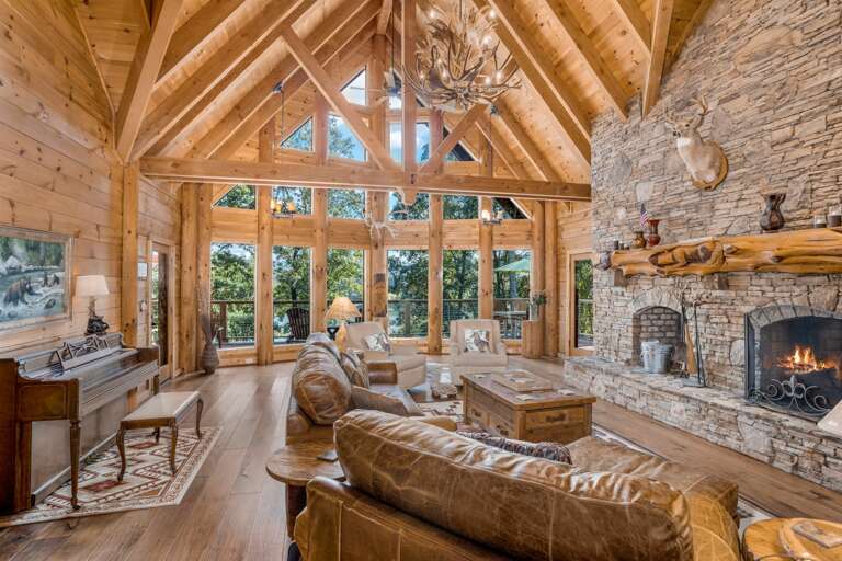 Lake Haven Lodge Great Room with Stone Fireplace and Piano Overlooks Lake