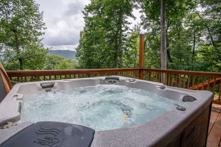Hot tub on lower deck Hot tub on lower deck