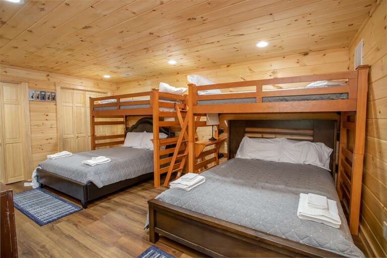 Lower level bunk room with 2 twin-over-queen beds (6 sleeping spots) Lower level bunk room with 2 twin-over-queen beds (6 sleeping spots)
