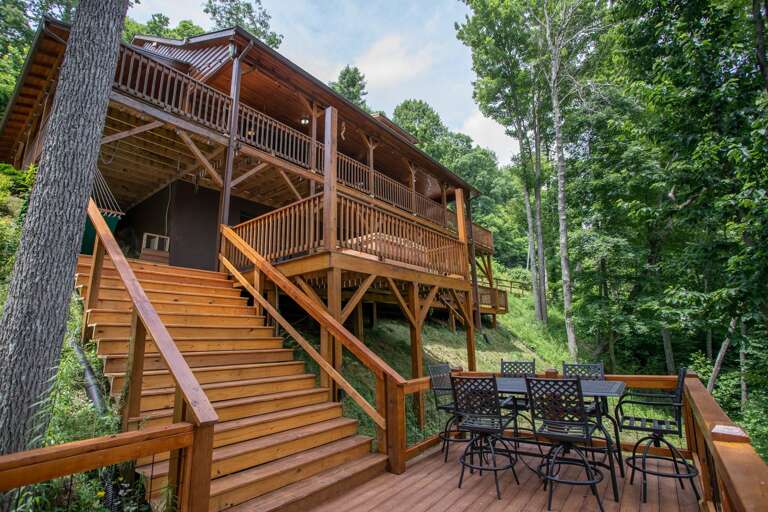 Lowest level deck with dining table Lowest level deck with dining table