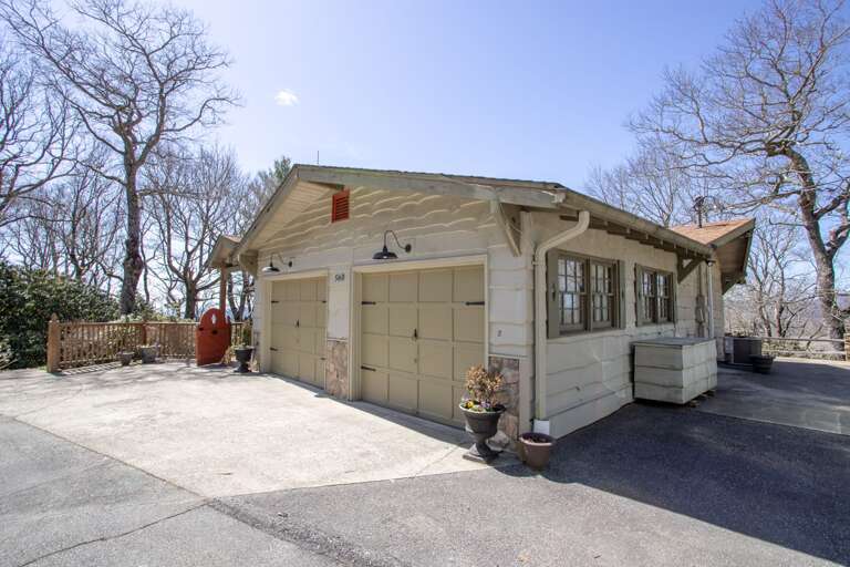 Parking in front and side.  Note: garage space is not available for guest use. Parking in front and side.  Note: garage space is not available for guest use.