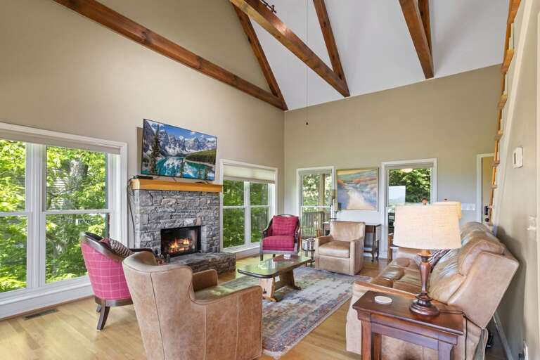 Central Stone Gas Log Fireplace and Huge HD Smart TV in Great Room Central Stone Gas Log Fireplace and Huge HD Smart TV in Great Room