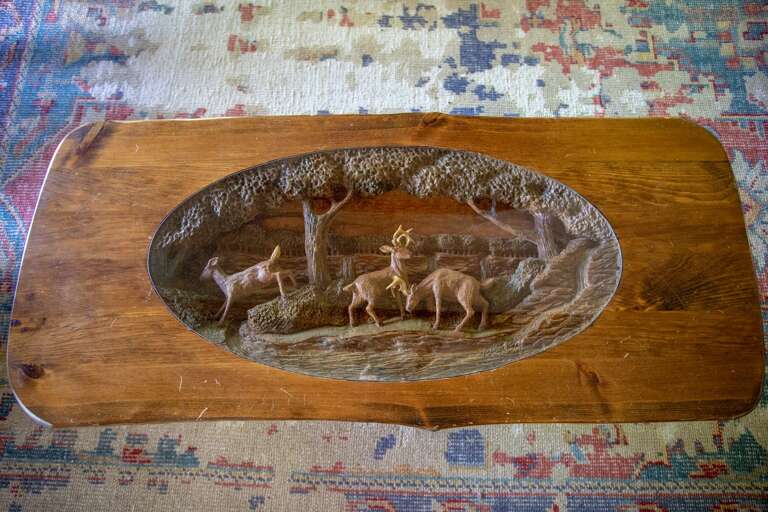 Come check out this Amazing One-of-a-Kind Hand-carved Coffee Table with intricate Nature Scene in the Great Room! Come check out this Amazing One-of-a-Kind Hand-carved Coffee Table with intricate Nature Scene in the Great Room!