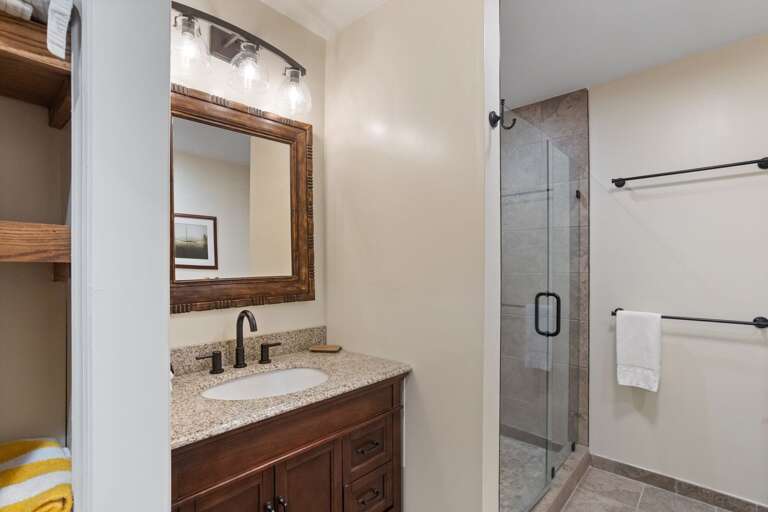 EnSuite Master Bathroom with Granite Vanity Counter, Custom Tile Shower, and Soaking Tub EnSuite Master Bathroom with Granite Vanity Counter, Custom Tile Shower, and Soaking Tub