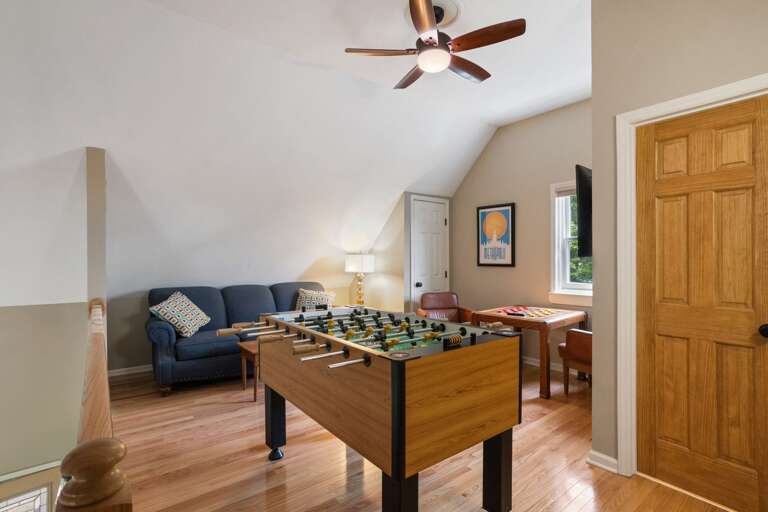 Loft has Foosball Table, Game-playing Table, HD Smart TV, Comfy Sleeper Sofa and Trundle Bed, and Half Bathroom! Loft has Foosball Table, Game-playing Table, HD Smart TV, Comfy Sleeper Sofa and Trundle Bed, and Half Bathroom!