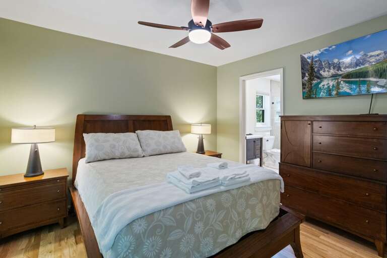 Main level Queen Bedroom with HD Smart TV and EnSuite Full Bathroom Main level Queen Bedroom with HD Smart TV and EnSuite Full Bathroom