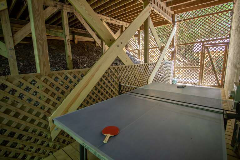 Outdoor Ping Pong Table in Hidden Nook beneath Front Porch! Outdoor Ping Pong Table in Hidden Nook beneath Front Porch!