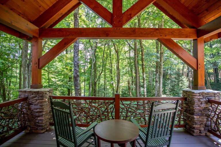 Covered Front Porch looks out at what will be Seasonal Winter Views once the October Leaf Season claims the foliage