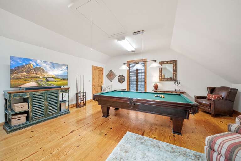 Huge Family Room and Game Room with HD Smart TV, Comfy Furniture, and Pool Table!