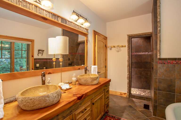 Private EnSuite Master Bathroom with Custom Tile Shower, Live Edge Vanity and two Stone Vessel Sinks!