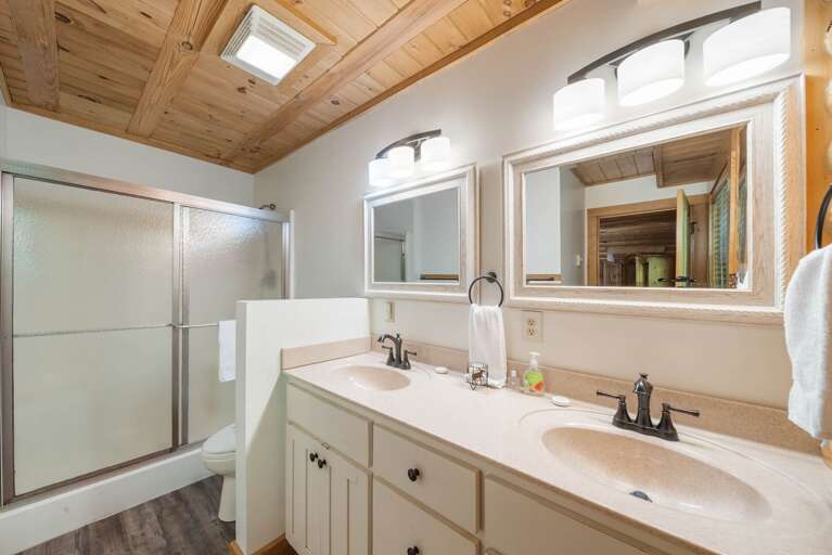 Bathroom with Walk-In Shower and Dual Vanity