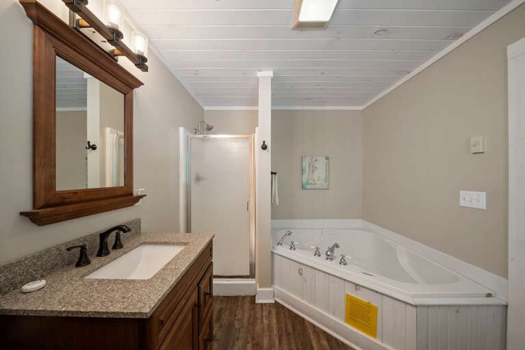 Ensuite Bathroom with Soaking Tub and Step-In Shower
