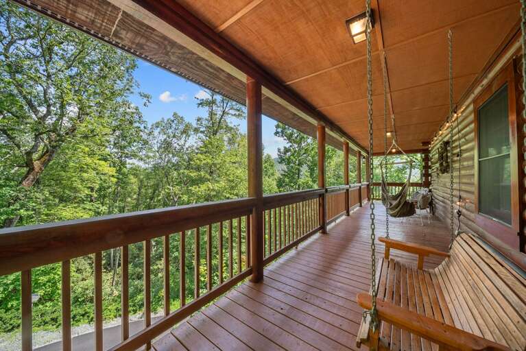 Porch Swing and Swinging Chairs on the Covered Deck