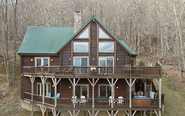 Decks on Each Level Span the Length of the House