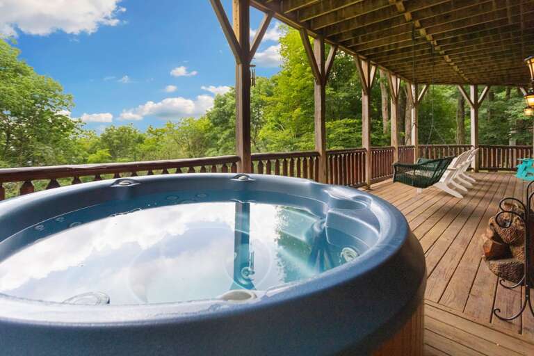 Hot Tub, Porch Swing and Adirondack Chairs on the Lower Level Deck