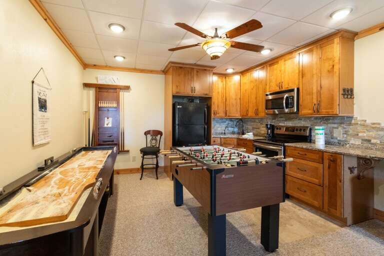 Lower Level Game Room with a Full Kitchen, Shuffleboard and Foosball Table