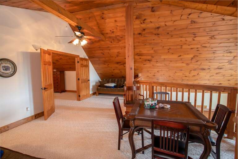 Generous Open Loft with Card Table - Couch Has Been Changed to Twin Bed