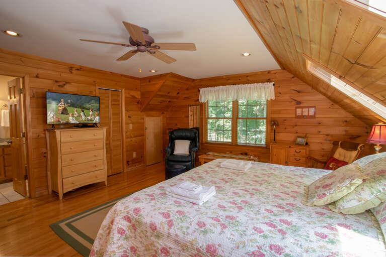 King Master Suite with HD Smart TV and Leather Chair with Ottoman