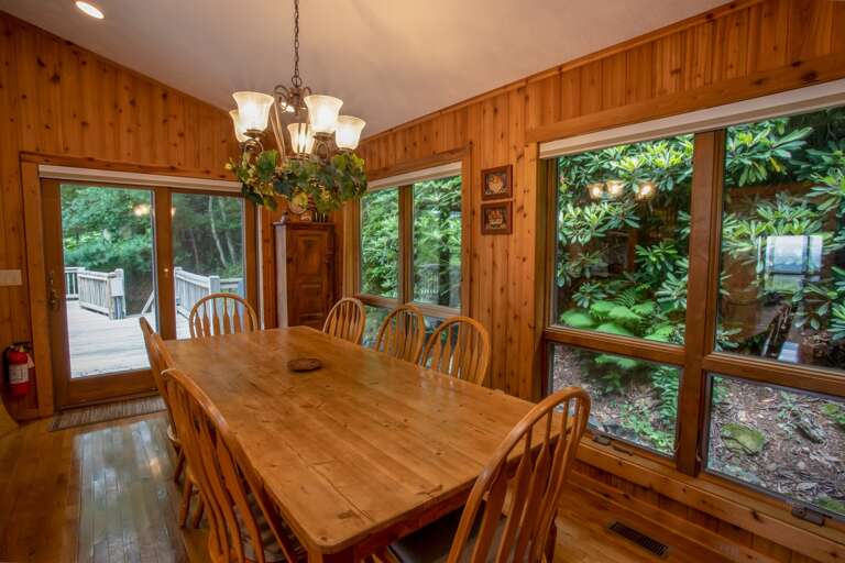 Dining Room with Huge Windows, just inside the Deck with Outdoor Dining and Gas Grill
