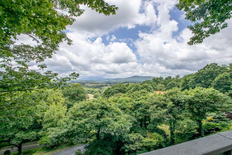 Layered Long Range Mountain Views from Serendipity Deck, even in the heart of Summer!