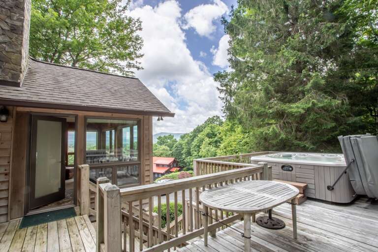 Main Level Deck with Outdoor Dining Table (chairs kept inside), Gas Grill, and Hot Tub