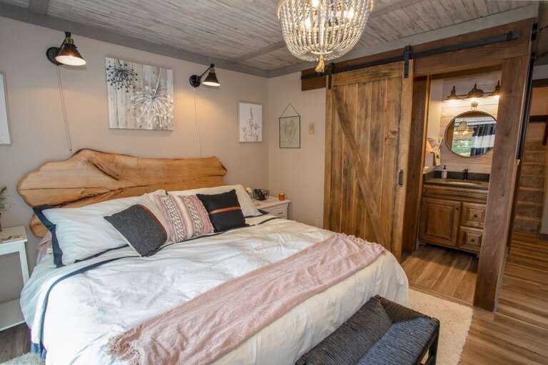 King Master Suite with EnSuite Master Bathroom, featuring custom rolling Barn Door