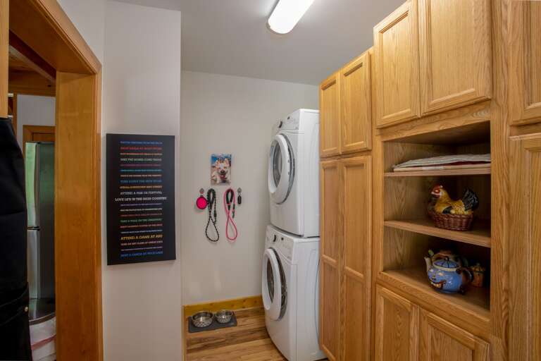 Main Level Mud and Laundry Room off of Kitchen with Front-Loading Washer and Dryer
