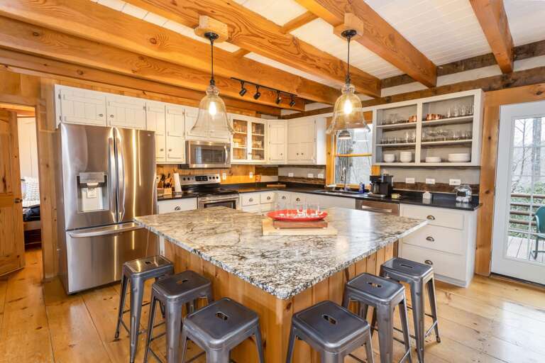Huge Granite Island with Bar Stool Seating for Six Guests Huge Granite Island with Bar Stool Seating for Six Guests