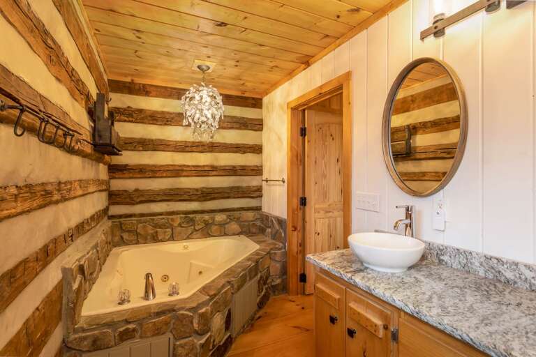 Rustic and Warm Main Level Bathroom with Private Water Closet Rustic and Warm Main Level Bathroom with Private Water Closet