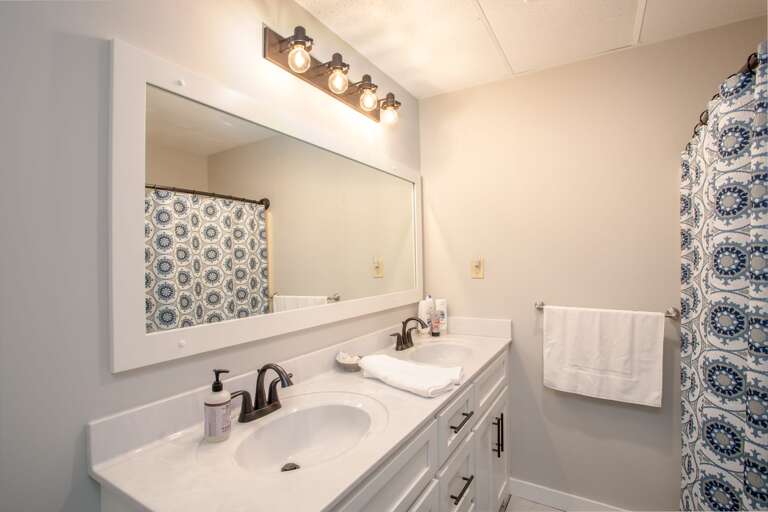 Lower Level twin vanity bathroom