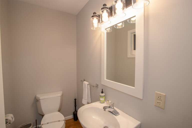 Main floor half bath off the kitchen