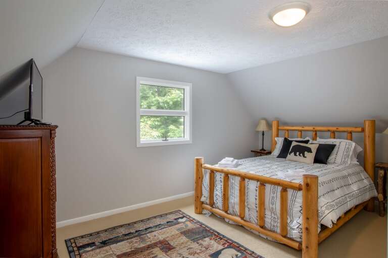 Queen Bedroom on upper level with TV