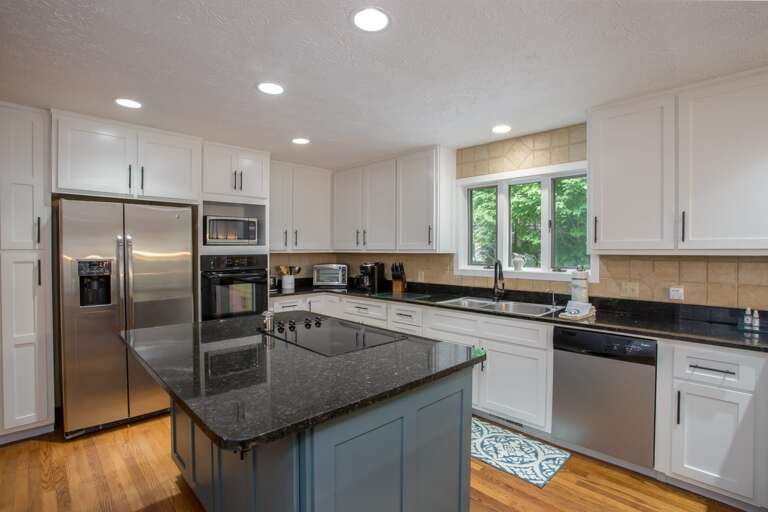 Renovated Kitchen with Granite and Stainless appliances