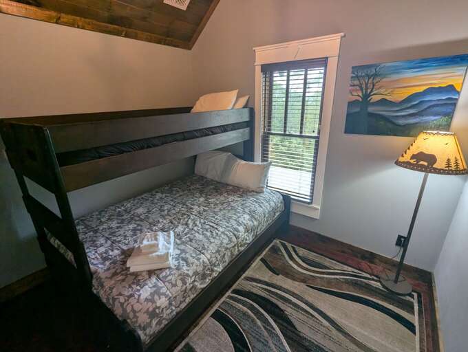 Bunk Room on the Top Floor with Twin-Over-Queen Bunk Beds Bunk Room on the Top Floor with Twin-Over-Queen Bunk Beds