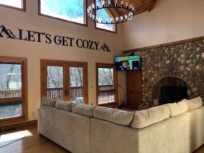 Great Room with Sunshine and Views through the Three-Level Wall of Glass