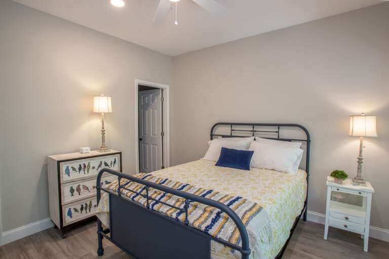 Queen bedroom on lower level Queen bedroom on lower level