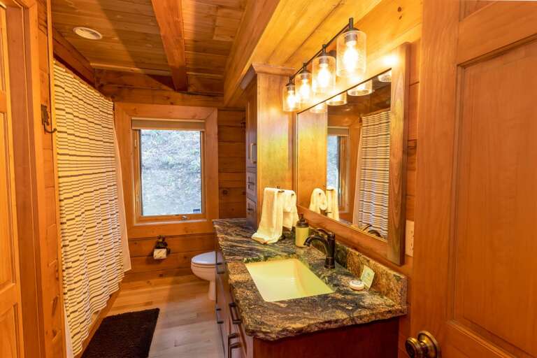 Full Bathroom on Main Level with Granite Vanity, Tub and Shower Combo