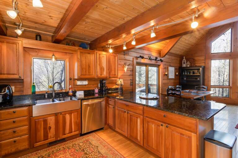 Open Kitchen with updated Granite Countertops and Apron-front Farm-style Stainless Sink!