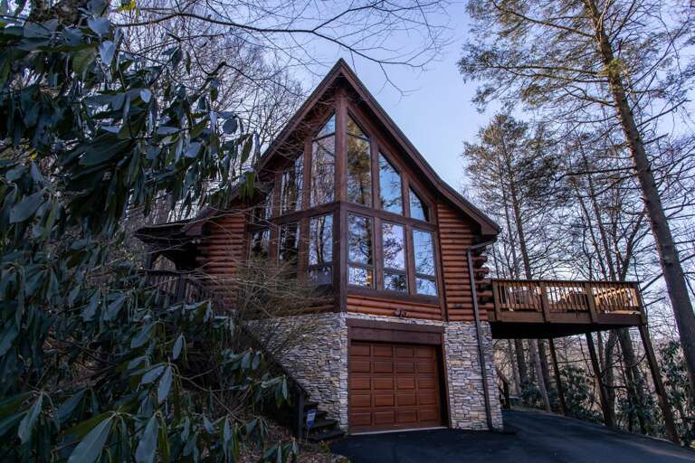 Surrounded by Mature Trees and Native Rhododendrons gives a "Treehouse" feel, with Mountain Views poking through the trees!