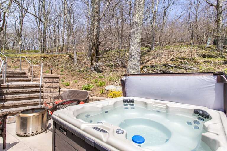 Hot Tub Next to the Wood Burning Fire Pit