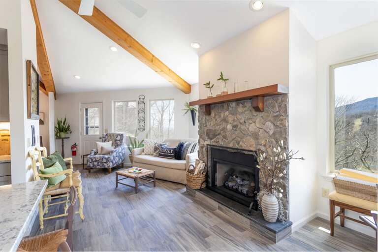 Stone Gas Log Fire Place Framed by Views