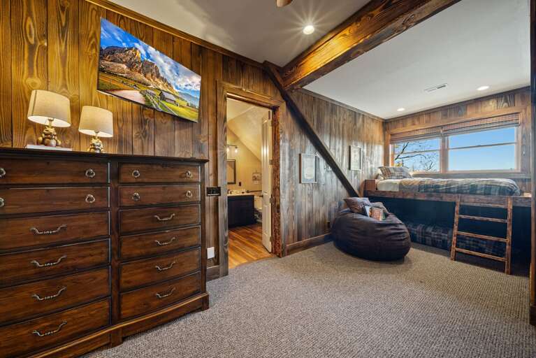 Bunk Room with Twin Over Full and Twin Over Twin Bunks and Additional Convertible Bean Bag Bed