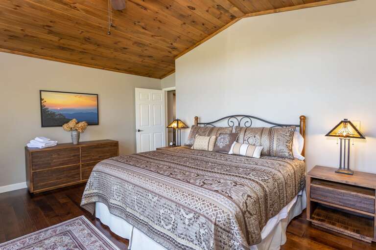 King Suite has TV, Deck Access and Private Bathroom King Suite has TV, Deck Access and Private Bathroom