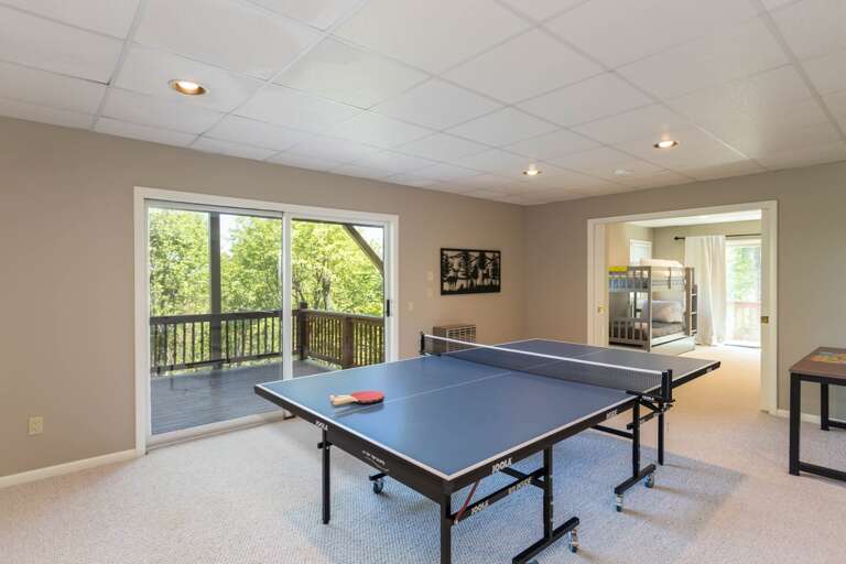 Ping Pong Game Table and Deck Access in the Lower Level Ping Pong Game Table and Deck Access in the Lower Level