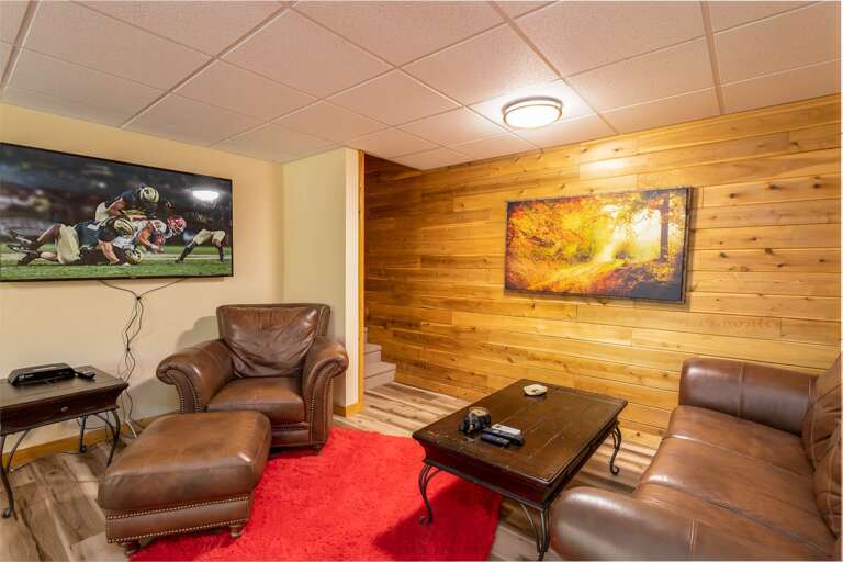 Leather Furniture and Large Flat Screen in the Downstairs Den