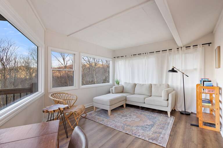 Enjoy a Quiet Place to Read or Watch the Sunrise in the Master Bedroom Sunroom Enjoy a Quiet Place to Read or Watch the Sunrise in the Master Bedroom Sunroom