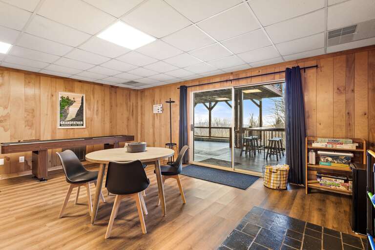 Lower Level Family Room with Games and Game Table, and Large Covered Lower Deck Lower Level Family Room with Games and Game Table, and Large Covered Lower Deck