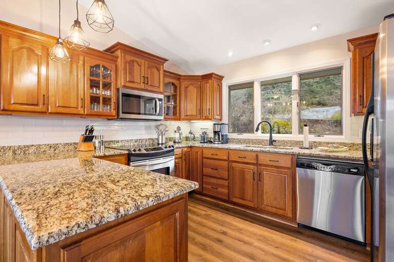 Stainless Appliances and Granite Counters in the Kitchen Stainless Appliances and Granite Counters in the Kitchen