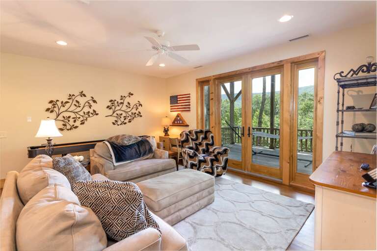 Lower Level Den with Deck, TV and Shuffleboard