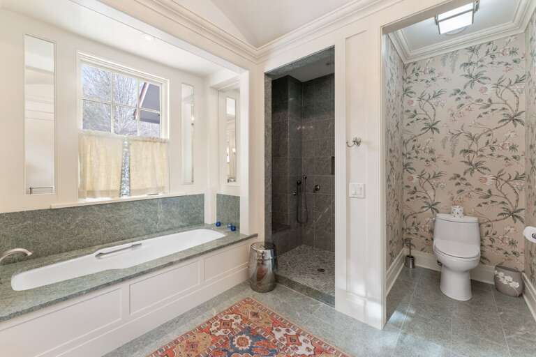 Jetted Soaking Tub, Duel Tiled Showers in the Large Master Bathroom